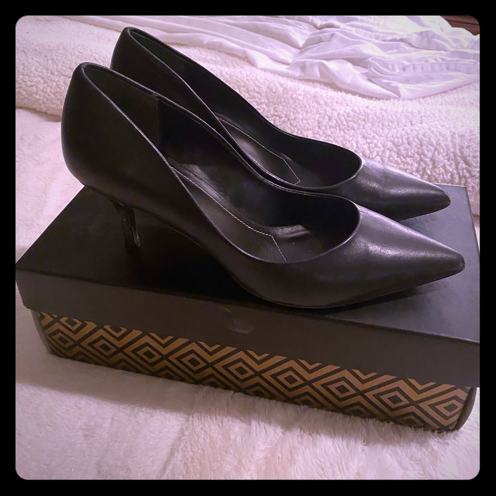 Black leather pumps